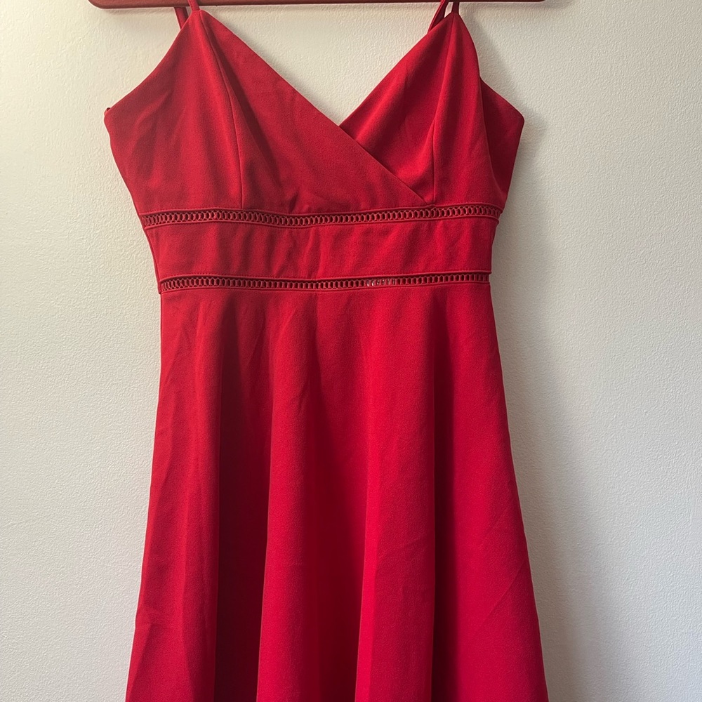 Red, flowy, dress from Francesca’s. Size L **runs small**